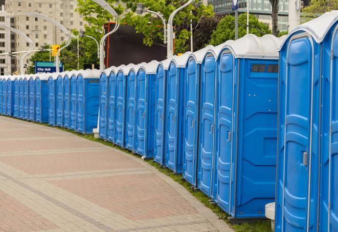 a row of sleek and modern portable restrooms at a special outdoor event in Haltom City TX